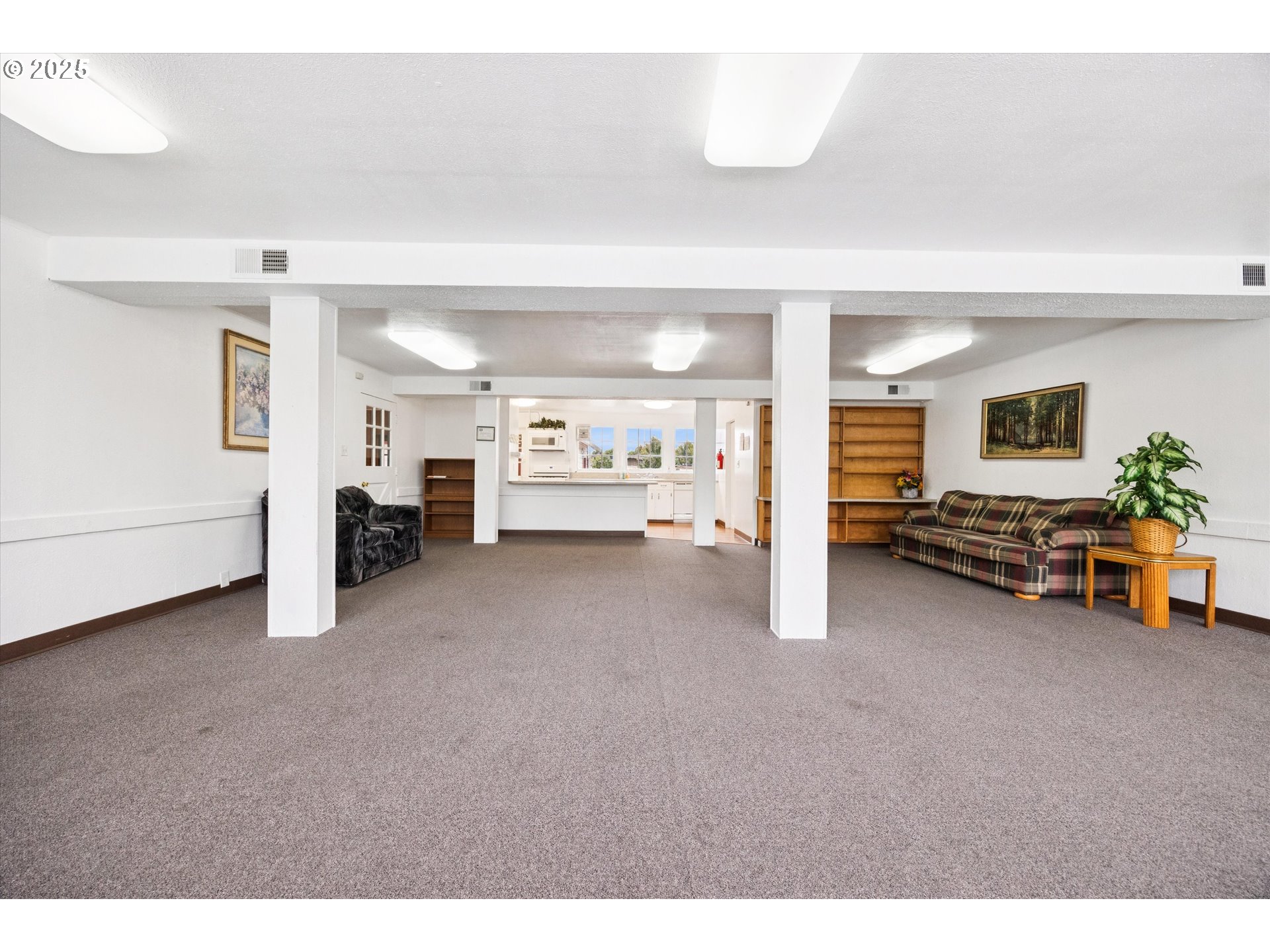 10701 Southeast Highway 212, Unit P6 Clackamas, OR 97015 - Photo 39 of 42 a living room with furniture and a dining table