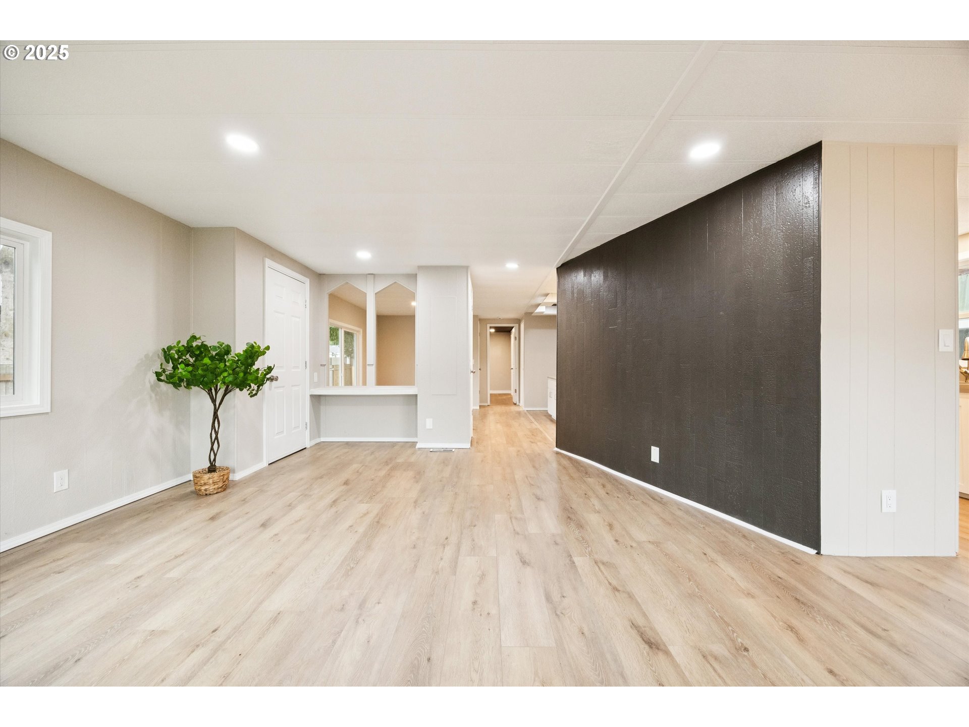 10701 Southeast Highway 212, Unit P6 Clackamas, OR 97015 - Photo 6 of 42 a view of an empty room with a window