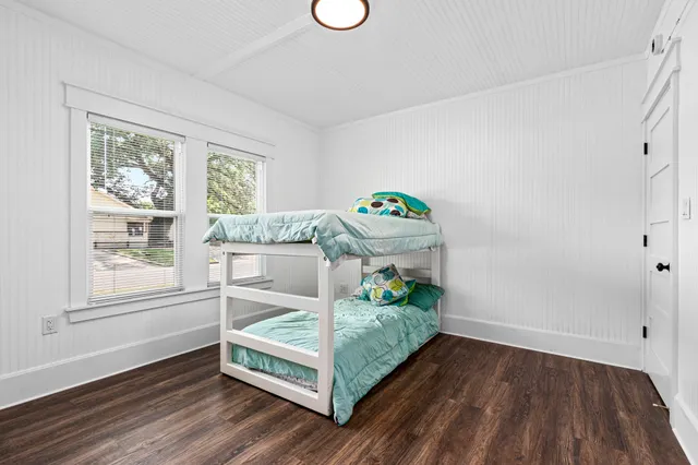 a room with window and a wooden floor