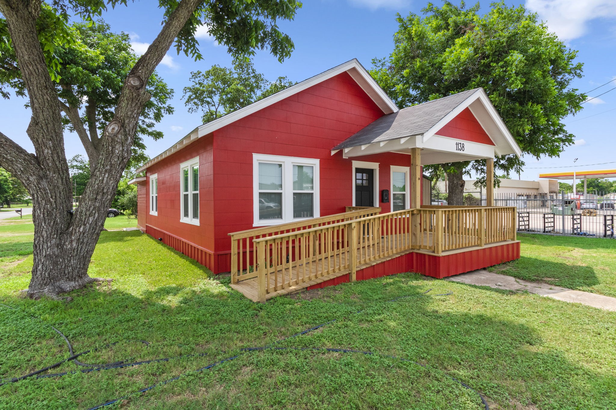 1138 Fannin Street Columbus, TX 78934 - Photo 20 of 25 a front view of house with yard and green space
