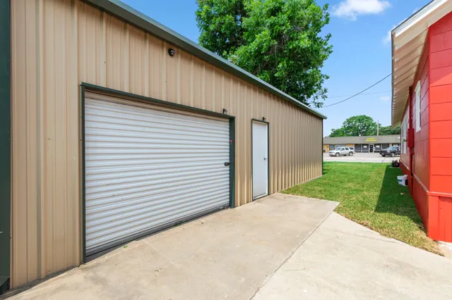 a view of a back yard of the house