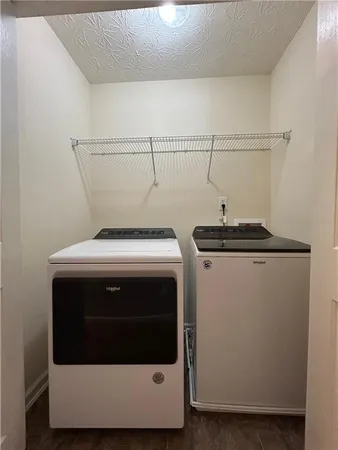 a utility room with a washer and dryer