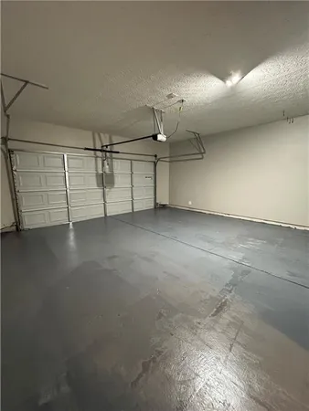 an empty room with shelves