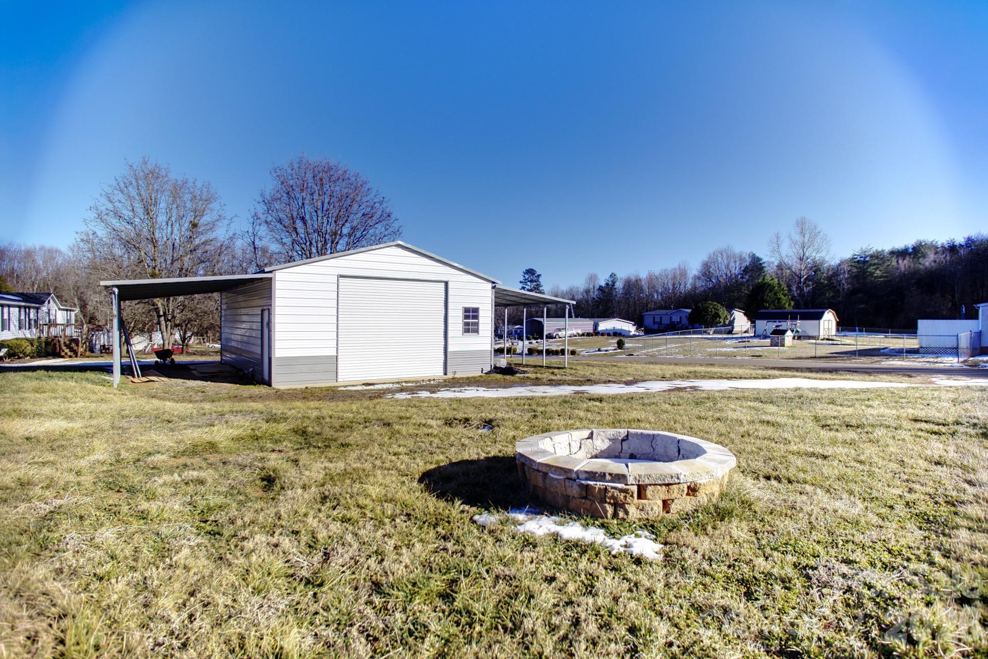 4610 Deal Road Claremont, NC 28610 - Photo 4 of 13 a swimming pool view with a outdoor space