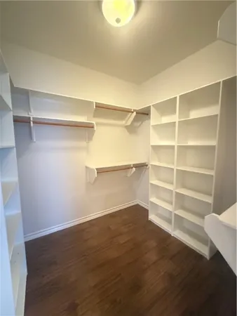 a view of an empty room with empty racks