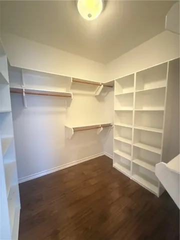 a view of an empty room with empty racks