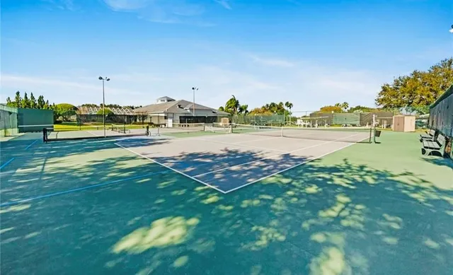 a view of a swimming pool with an ocean view