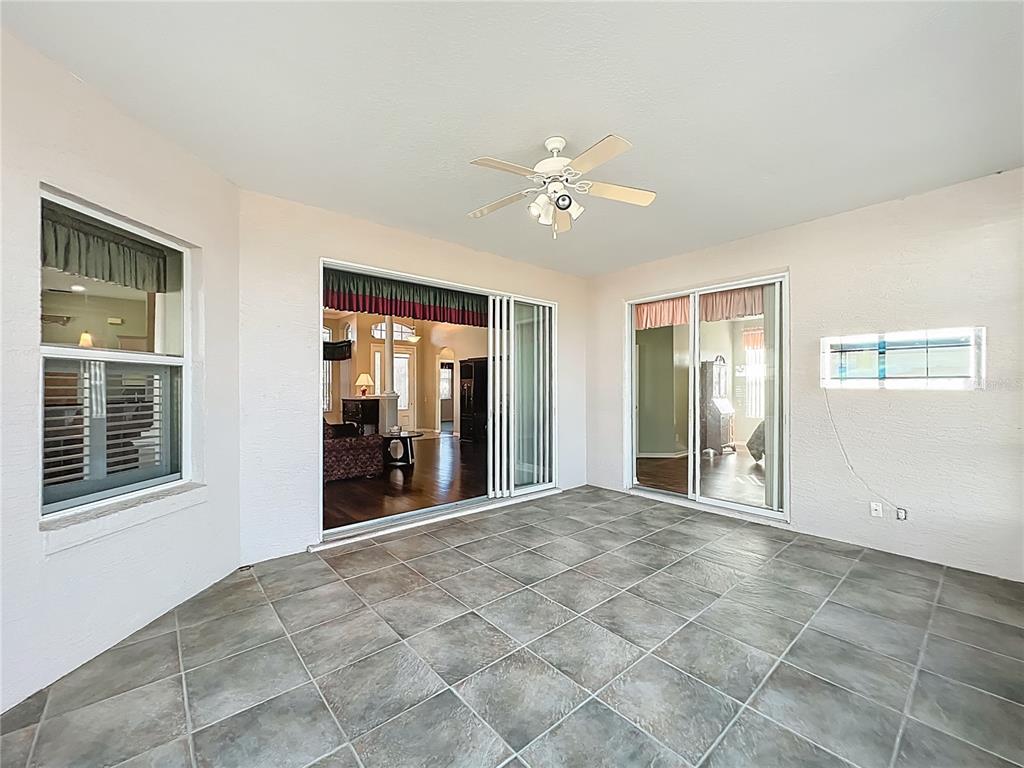 5685 Gulf Stream Street Tavares, FL 32778 - Photo 24 of 78 a view of an empty room with a window