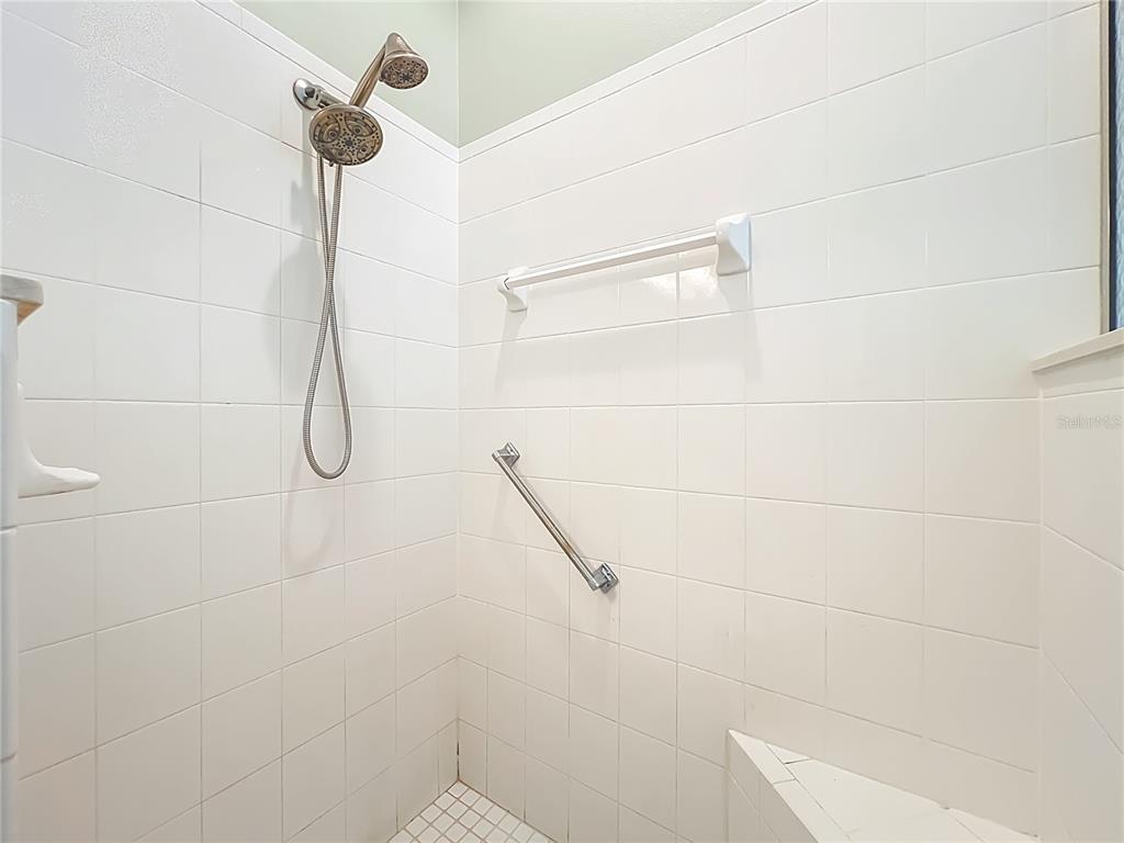 5685 Gulf Stream Street Tavares, FL 32778 - Photo 33 of 78 a bathroom with a shower and a shower