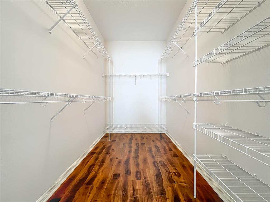 5685 Gulf Stream Street Tavares, FL 32778 - Photo 40 of 78 a view of a room with racks on the wall