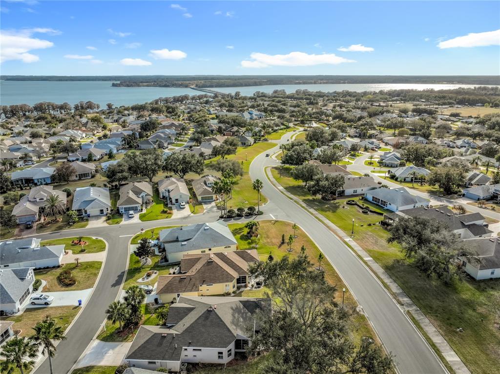5685 Gulf Stream Street Tavares, FL 32778 - Photo 10 of 78 an aerial view of residential houses with outdoor space
