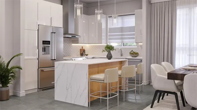 a dining room with furniture and a window