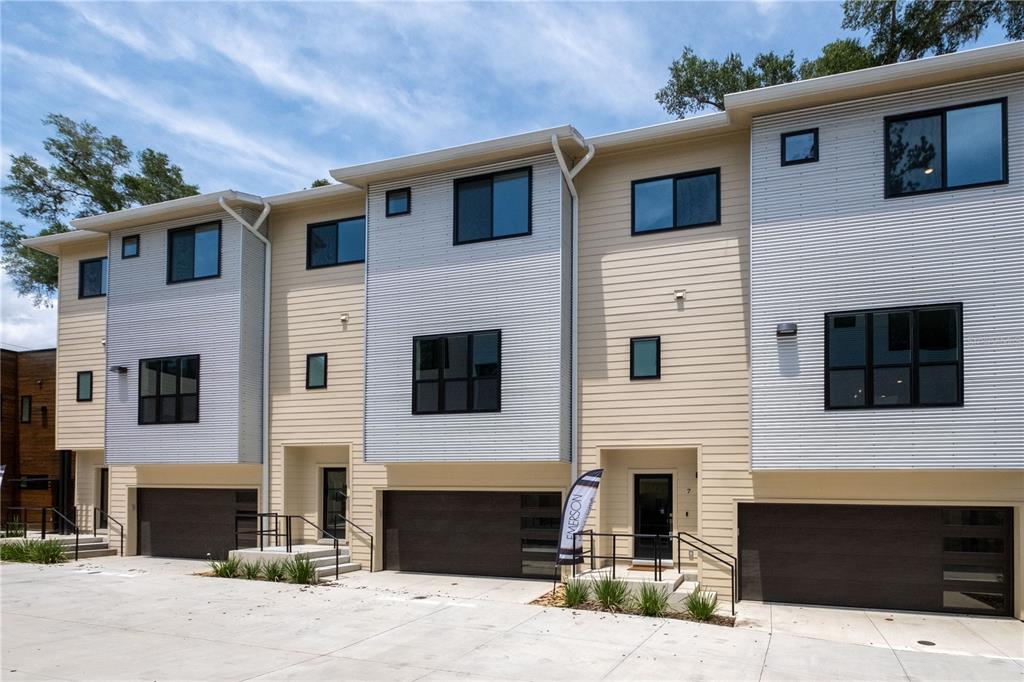 2601 Southwest Williston Road, Unit 8 Gainesville, FL 32608 - Photo 30 of 35 a front view of a house with yard