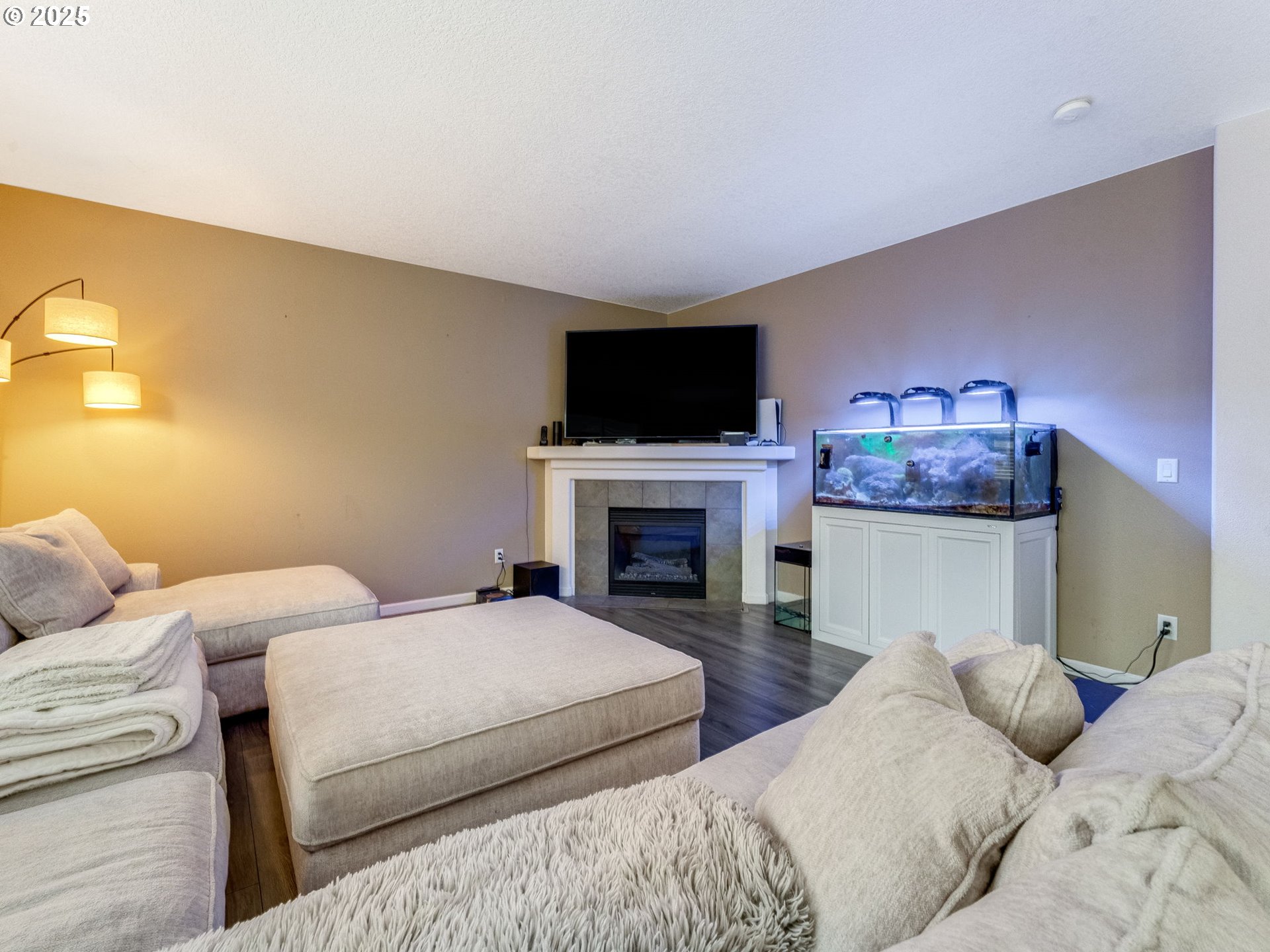 52144 Southeast 8th Street Scappoose, OR 97056 - Photo 13 of 48 a bedroom with a bed and a fireplace