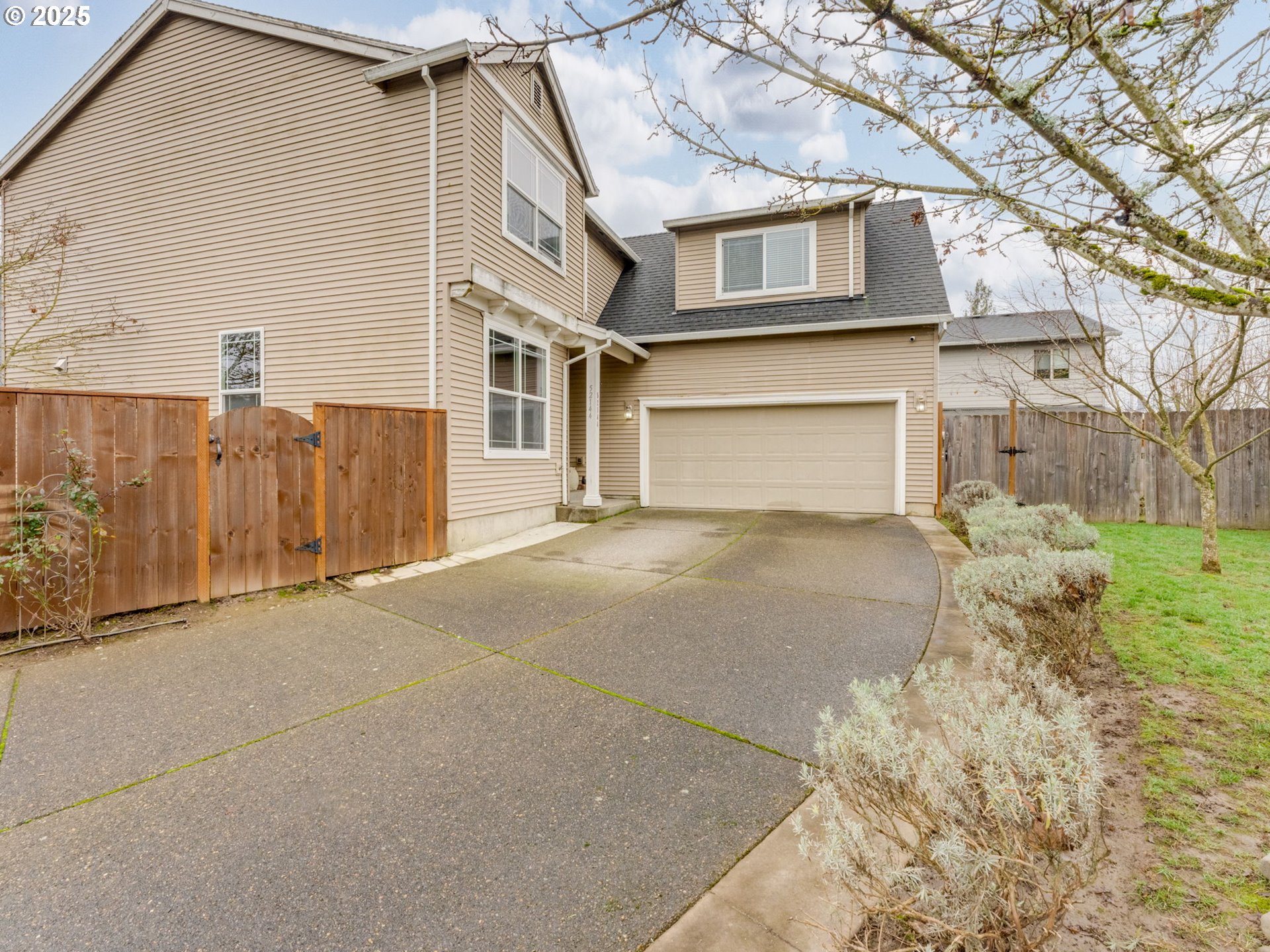 52144 Southeast 8th Street Scappoose, OR 97056 - Photo 2 of 48 a view of a house with a yard