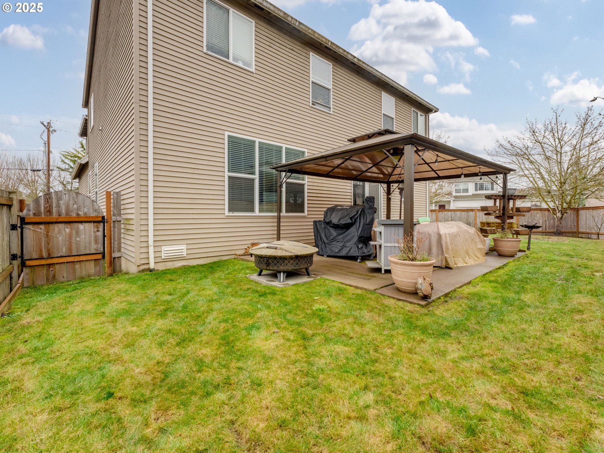 52144 Southeast 8th Street Scappoose, OR 97056 - Photo 40 of 48 a view of a house with backyard and porch
