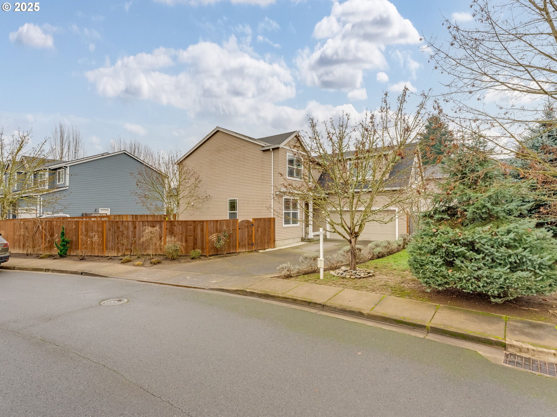 52144 Southeast 8th Street Scappoose, OR 97056 - Photo 4 of 48 a view of street with large building
