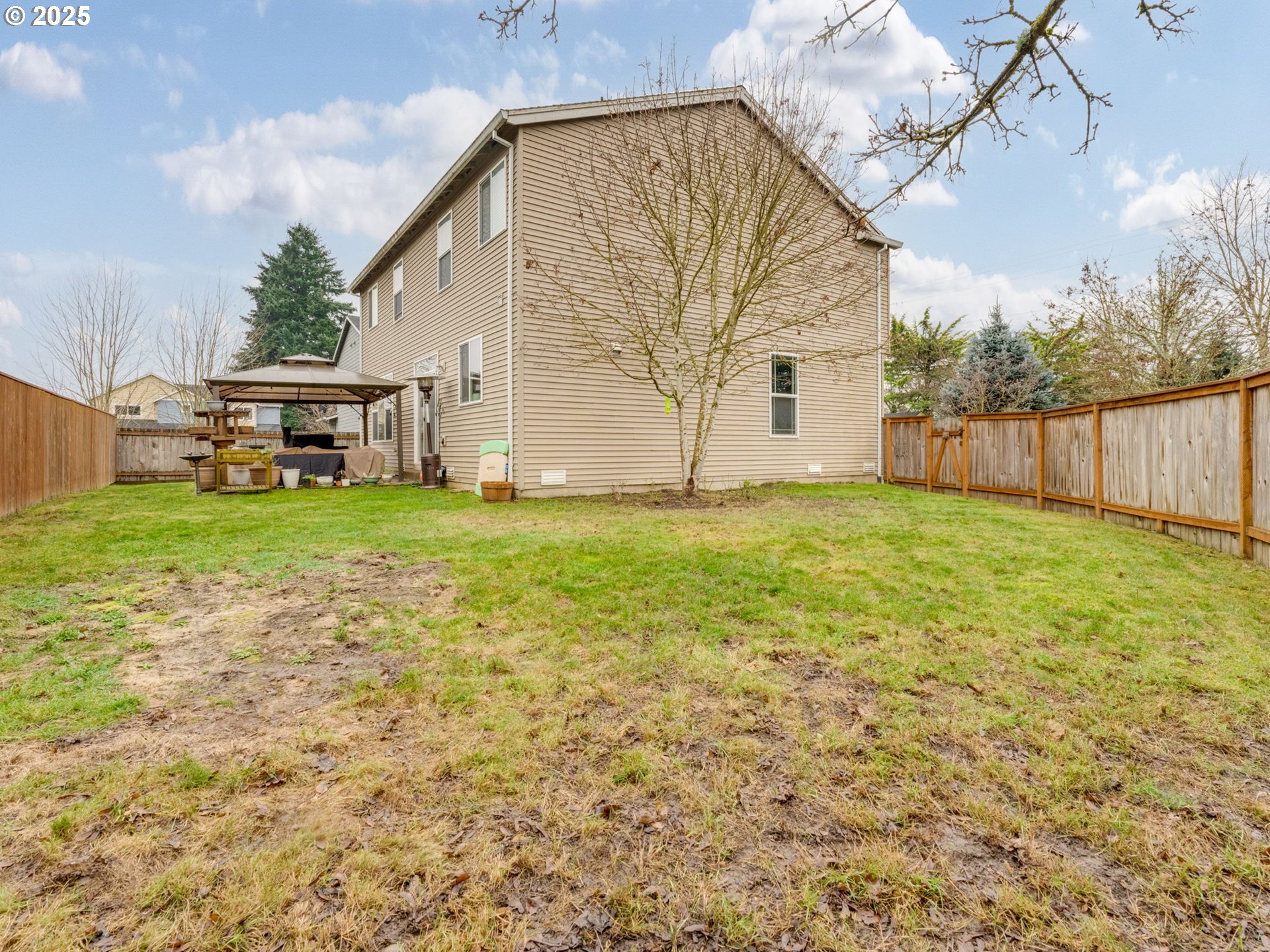 52144 Southeast 8th Street Scappoose, OR 97056 - Photo 42 of 48 a view of a house with a yard and garage