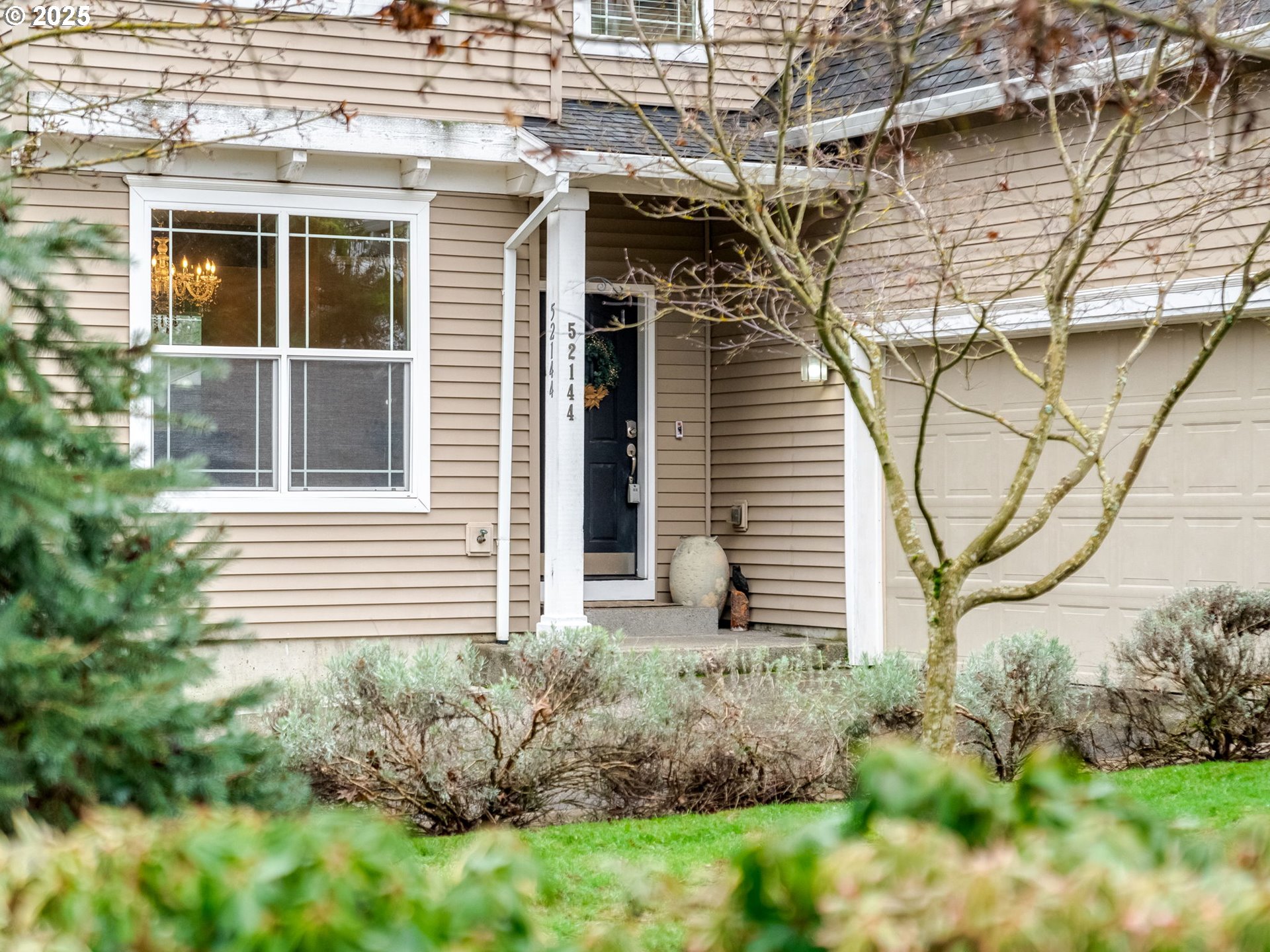52144 Southeast 8th Street Scappoose, OR 97056 - Photo 5 of 48 a view of a house with a yard