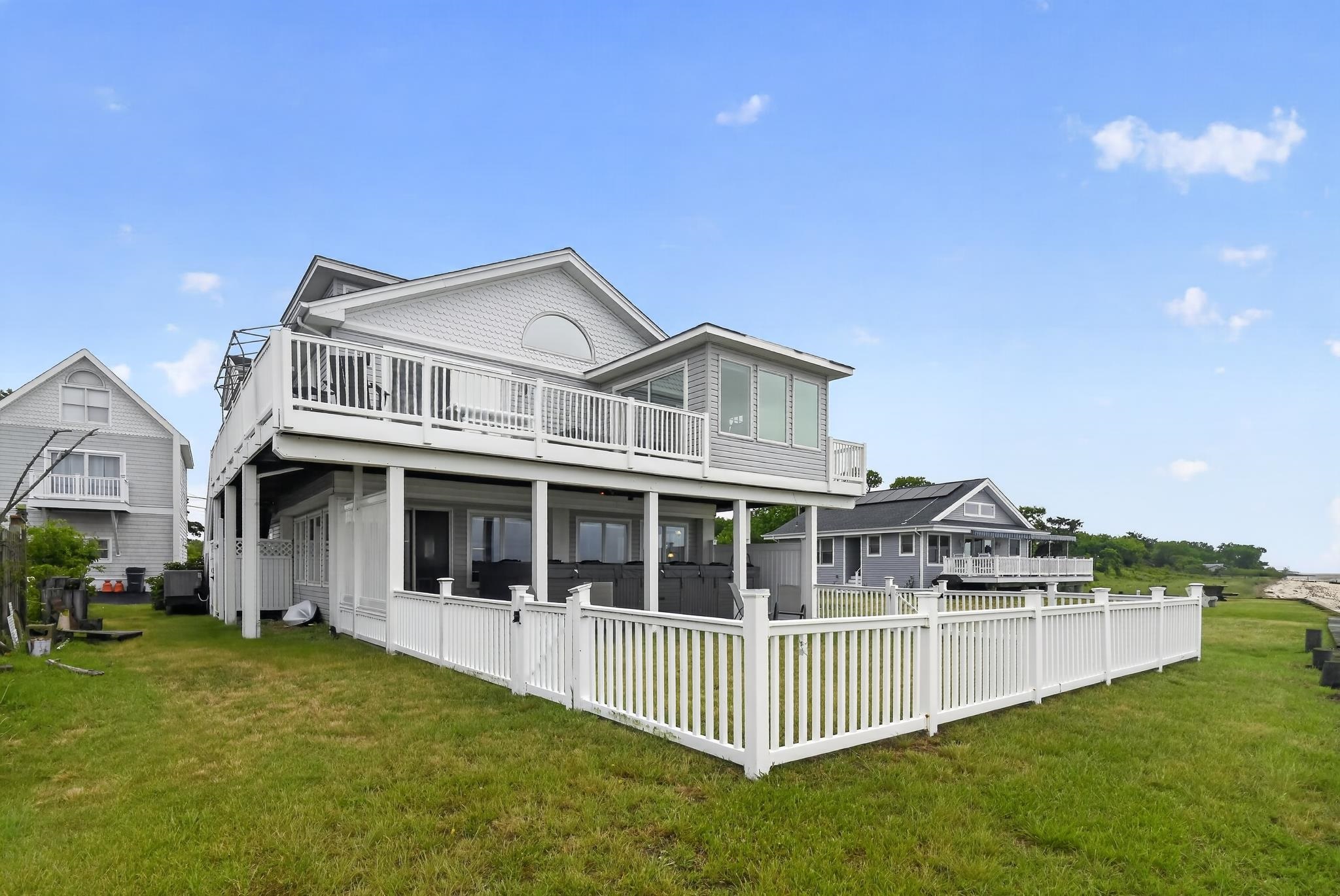 6 Pierces Point Road Cape May Court House, NJ 08210 - Photo 27 of 30 a view of a house with a garden and deck