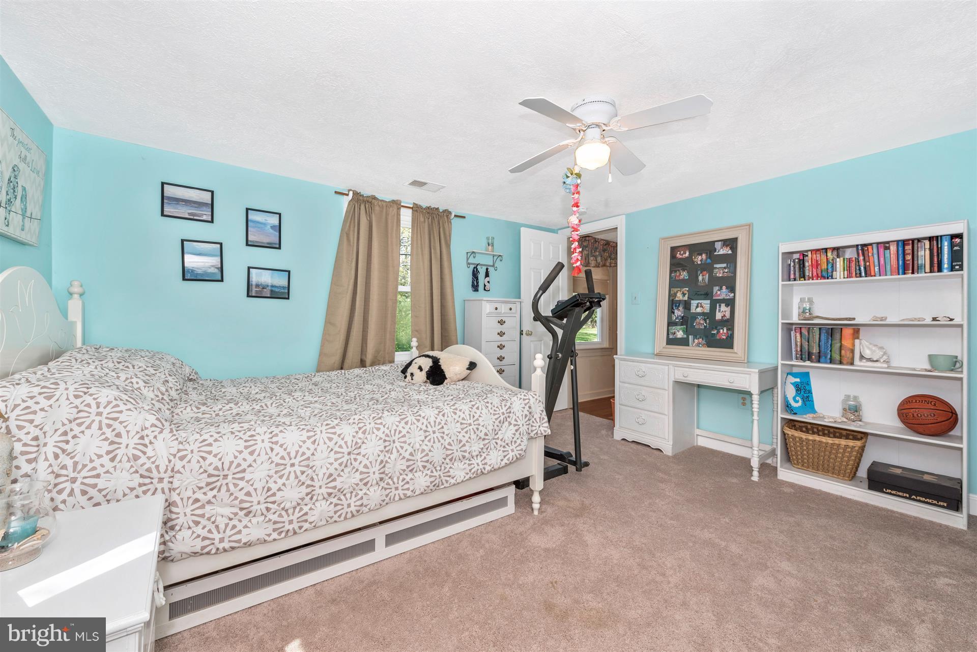 1210 Florence Road Mount Airy, MD 21771 - Photo 17 of 30 a bedroom with a bed and a cabinets