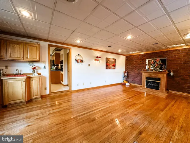 a view of a livingroom with wooden floor