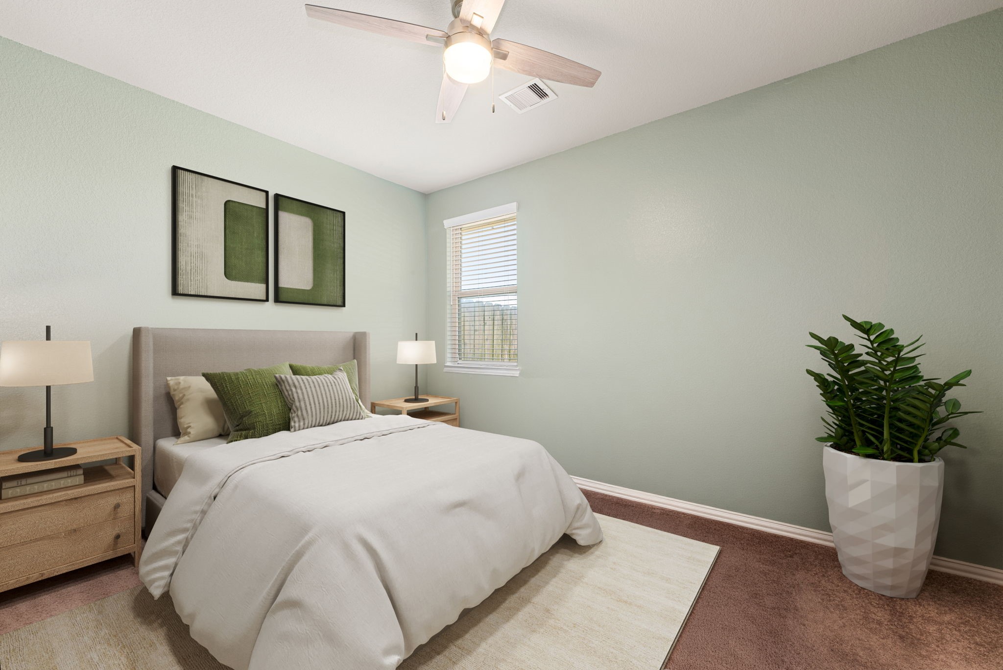 8414 Divot Trace Fulshear, TX 77441 - Photo 18 of 25 This serene bedroom features soft, sage-colored walls and warm wood-plank flooring. The room is brightened by a modern ceiling fan with an integrated light fixture and offers a clean, airy layout. Its neutral palette and simple architectural lines create a peaceful and versatile retreat.