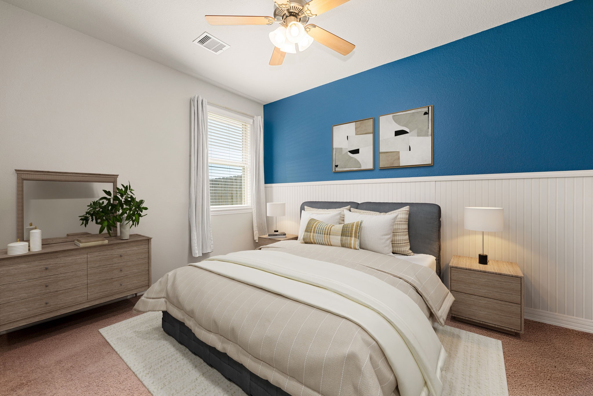 8414 Divot Trace Fulshear, TX 77441 - Photo 19 of 25 This spacious bedroom features a striking deep-blue accent wall that adds a sophisticated pop of color to the neutral palette. Large windows with custom blinds invite plenty of natural light, complemented by a modern ceiling fan and integrated recessed lighting. With its clean lines, this room offers a stylish and tranquil retreat.