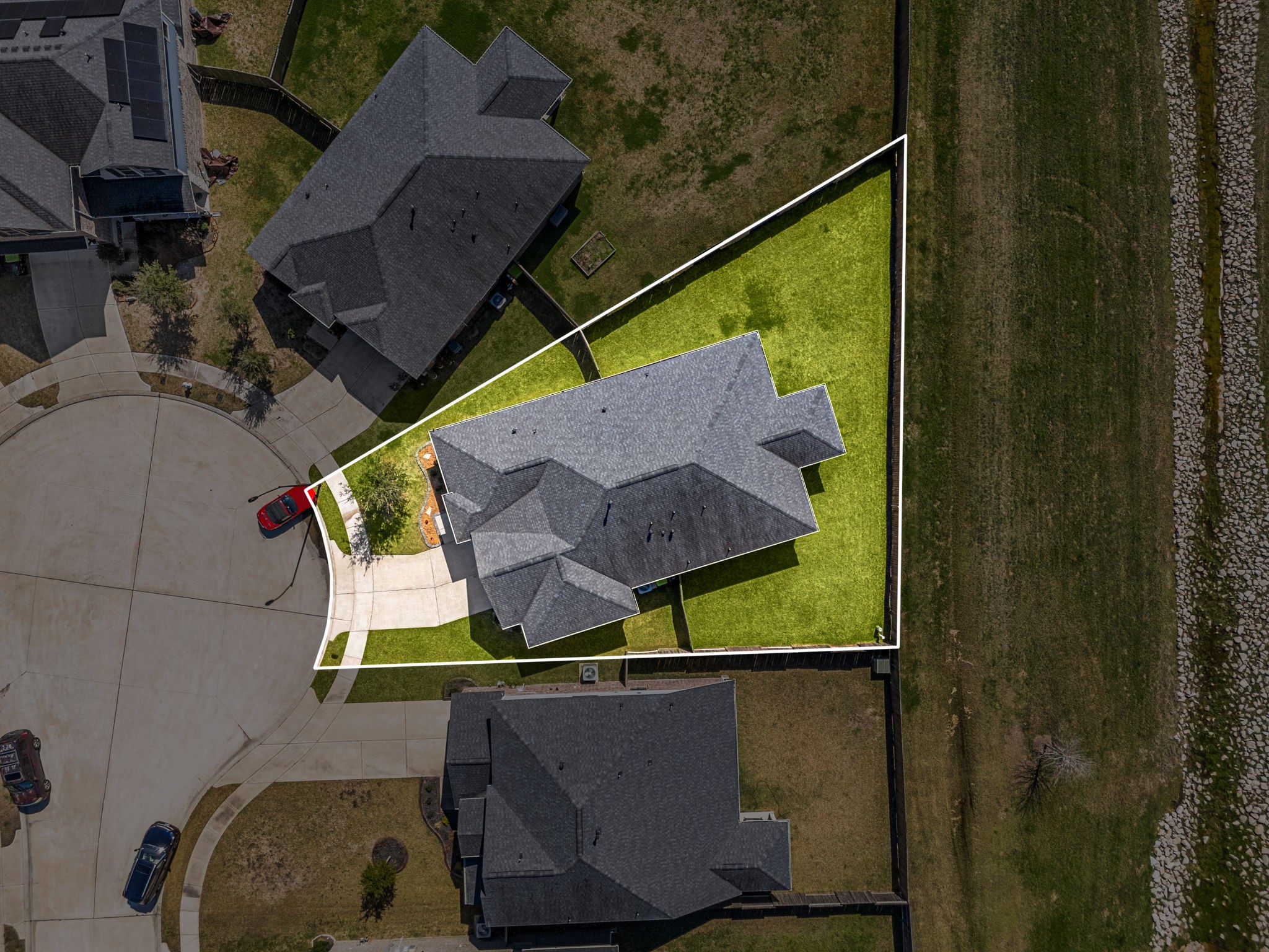 8414 Divot Trace Fulshear, TX 77441 - Photo 2 of 25 This home sits on a large lot with ample yard space in front and the back, lush landscaping and a well-maintained yard. Plenty of space to accommodate guest parking and situated on a quiet cul-de-sac street in the Polo Ranch community, with no back neighbors!