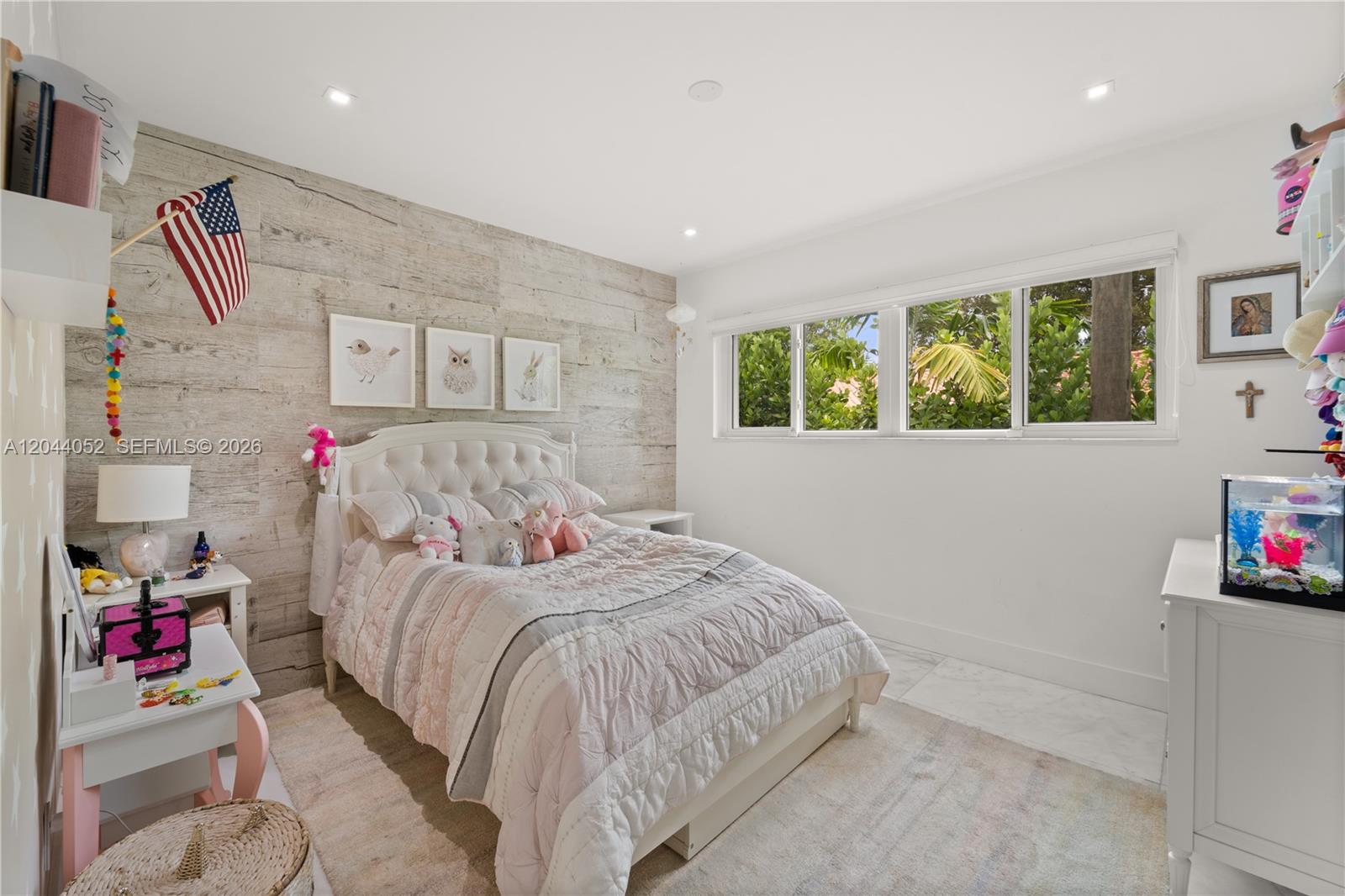 721 Bird Road Coral Gables, FL 33146 - Photo 10 of 24 a bedroom with a bed and a couch