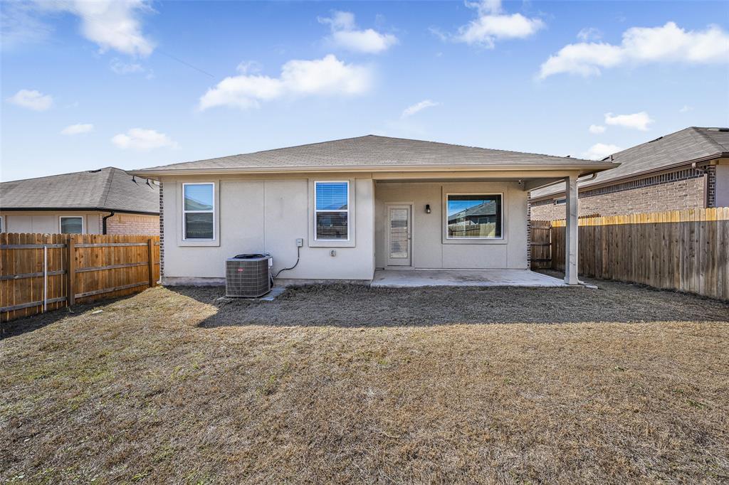 121 Mackinac Lane Georgetown, TX 78626 - Photo 16 of 16 a view of a house with a yard and garage