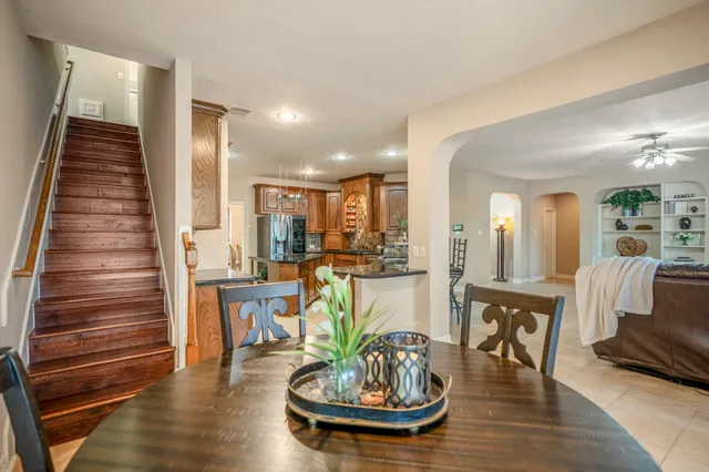 a kitchen with counter top space a sink and appliances