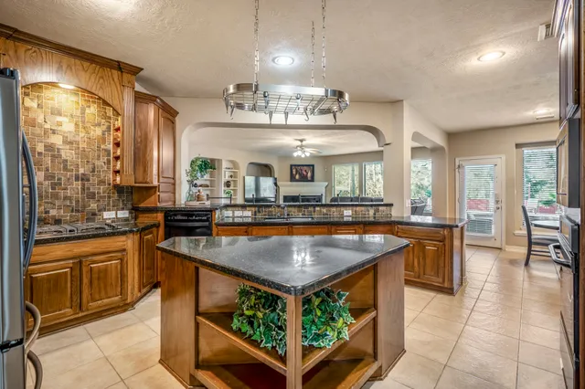 a bedroom with furniture and a wooden floor