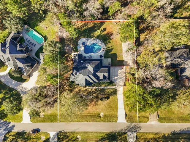 a view of yard along with trees