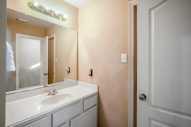 a view of a house with a parking space