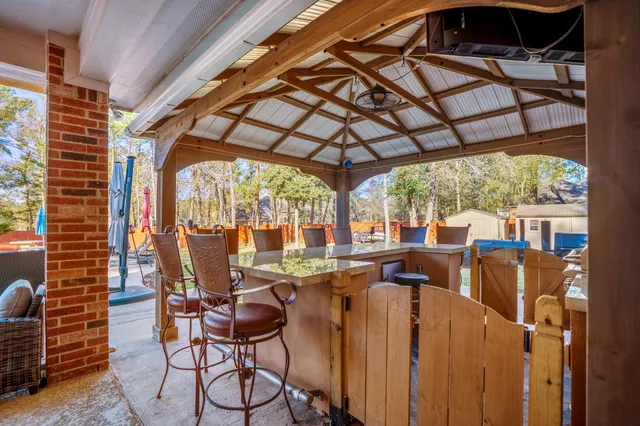a kitchen with stainless steel appliances granite countertop a stove a sink and dishwasher