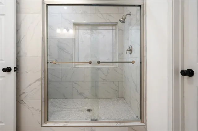 an empty room with a empty space and windows