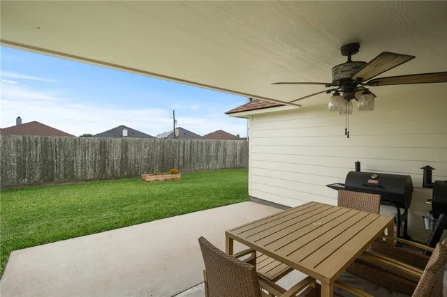 a view of a workspace with furniture