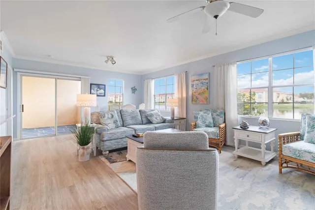 a kitchen with white cabinets and appliances