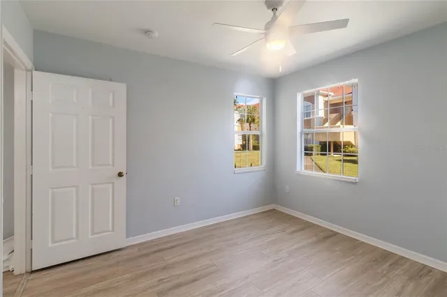 a bathroom with a sink and a window