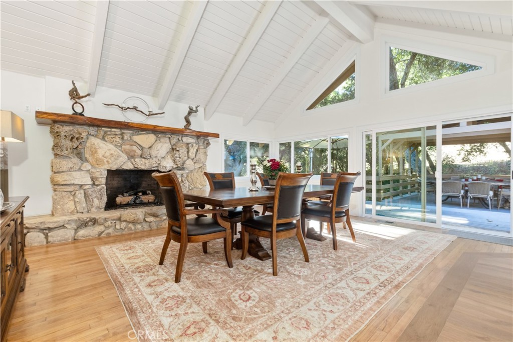 1545 Willow Creek Road Paso Robles, CA 93446 - Photo 10 of 52 Natural light fills the living spaces, with direct access to the back deck for seamless indoor-outdoor entertaining alongside Sheep Camp Creek.