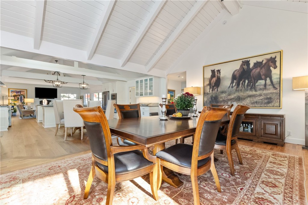 1545 Willow Creek Road Paso Robles, CA 93446 - Photo 11 of 52 Formal dining space featuring high ceilings, beam accents, and seamless connection to the surrounding living areas and kitchen.