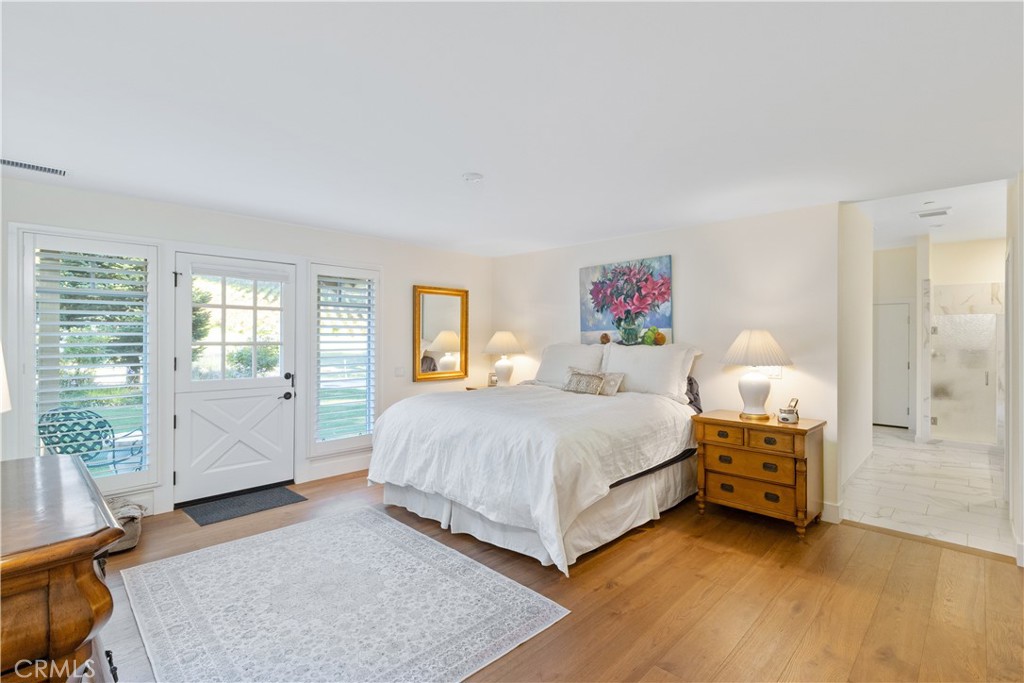 1545 Willow Creek Road Paso Robles, CA 93446 - Photo 23 of 52 Primary bedroom with direct access to a private patio.