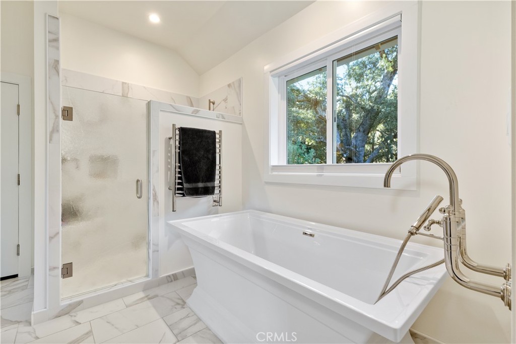 1545 Willow Creek Road Paso Robles, CA 93446 - Photo 26 of 52 Spacious walk-in shower and freestanding tub designed for relaxation and everyday comfort.