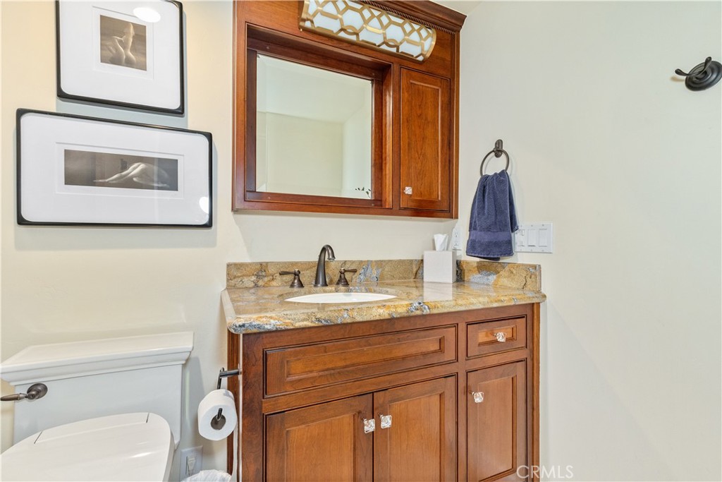 1545 Willow Creek Road Paso Robles, CA 93446 - Photo 31 of 52 Private ensuite equipped with a 3/4 shower, sink, and toilet.