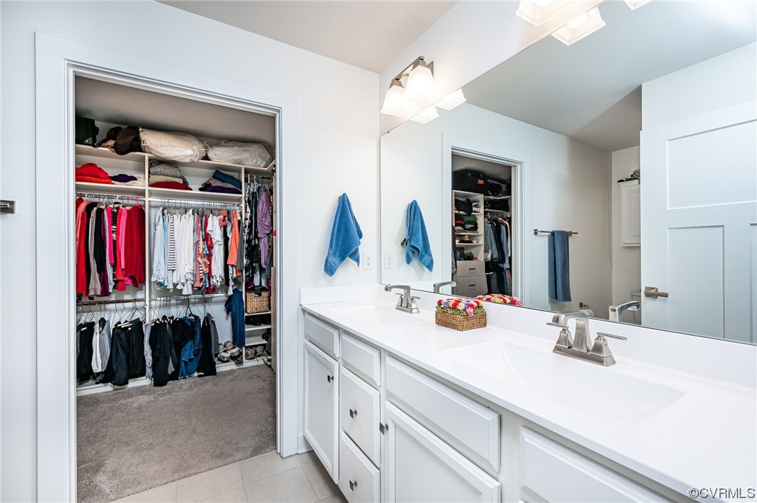 719 Vickilee Road Chesterfield, VA 23236 - Photo 30 of 40 Walk-in closet off primary bathroom includes a custom designed and installed storage system.