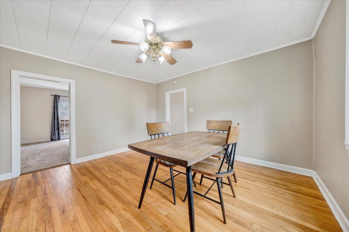 5398 Goodview Road Goodview, VA 24095 - Photo 11 of 59 a view of a dining room with furniture and wooden floor