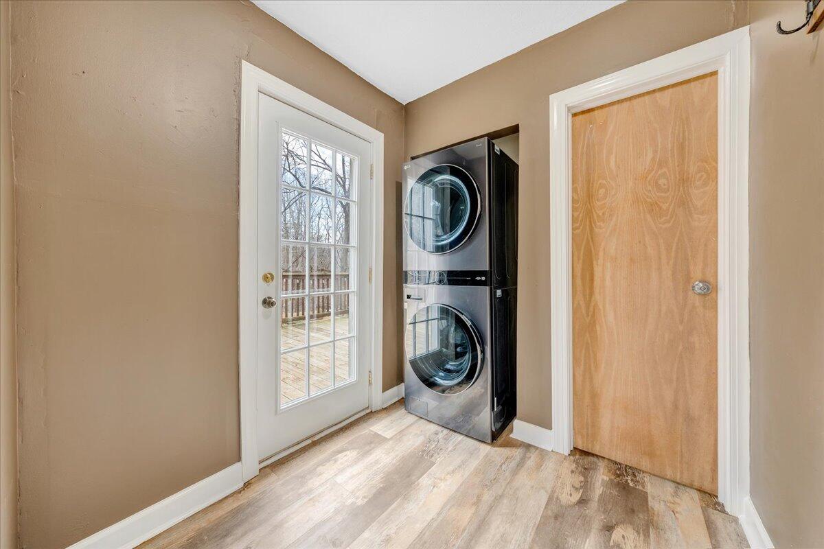5398 Goodview Road Goodview, VA 24095 - Photo 16 of 59 a view of a hallway with washer and dryer