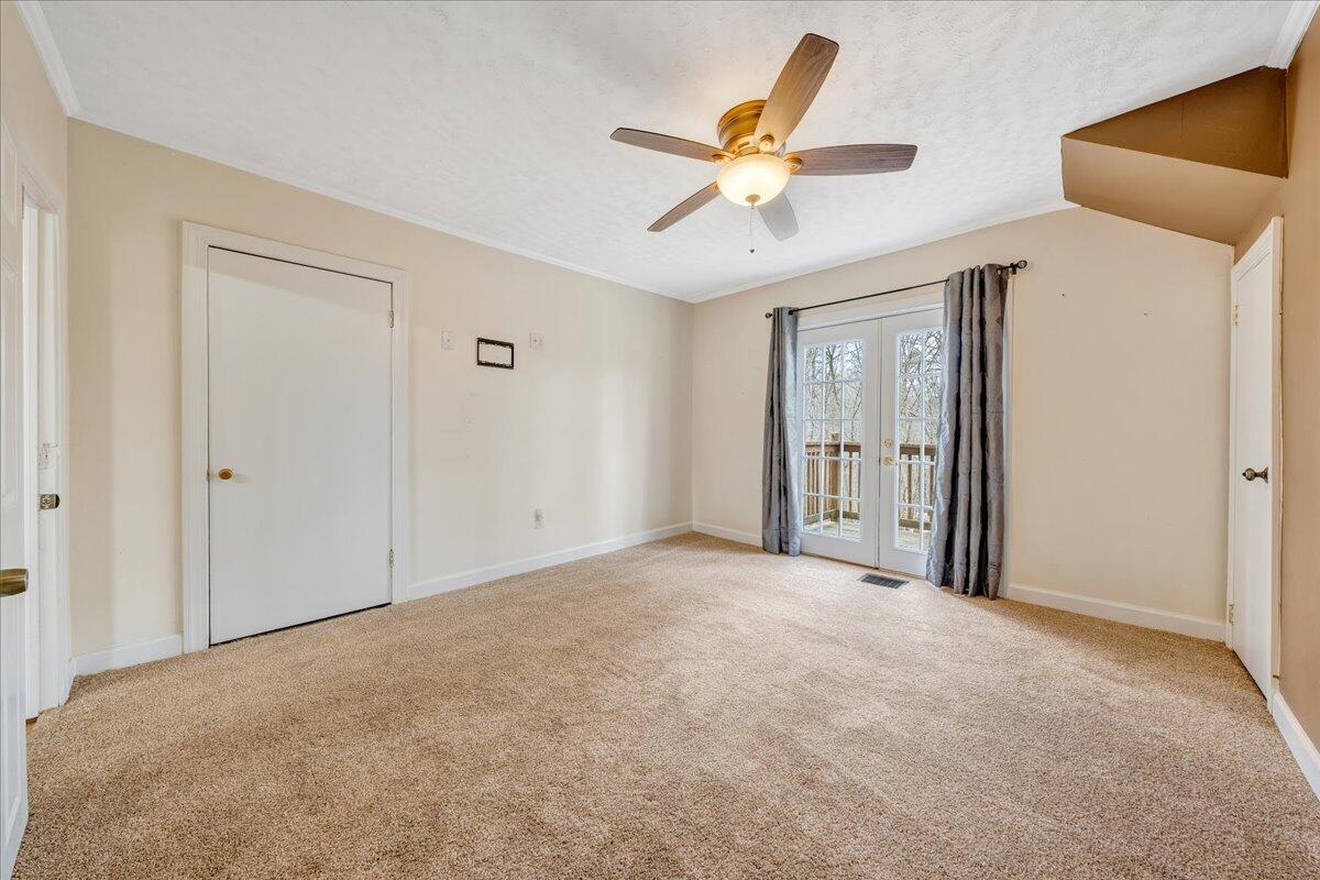 5398 Goodview Road Goodview, VA 24095 - Photo 20 of 59 a view of a livingroom with a ceiling fan