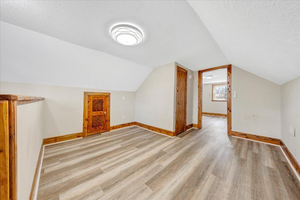 5398 Goodview Road Goodview, VA 24095 - Photo 24 of 59 a view of empty room with wooden floor